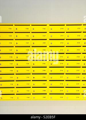 Yellow mail boxes in a new building