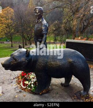 Wojtek the bear statue in Princes Street gardens in Edinburgh, Scotland. Adopted as a cub Wojtek went through WW11 as a member of a Polish army unit, surviving conflict in the Middle East and Europe. Stock Photo