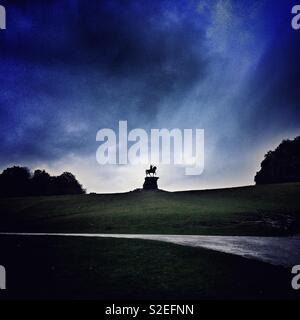 The Copper Horse, a statue marking the end of the Long Walk at Snow Hill in Windsor Great Park. It is a statue of George III on horseback. Stock Photo