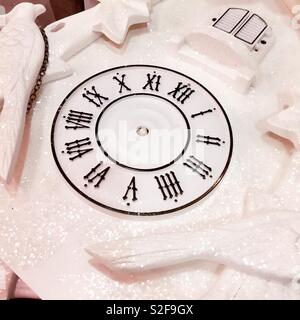 Clock face with no hands on a pure white vintage cuckoo clock Stock Photo