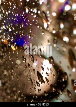 Rain drops on a car window Stock Photo