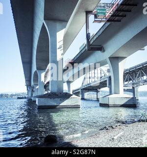 Pale photo of I-90 bridge to Mercer Island over Lake Washington, Seattle Stock Photo