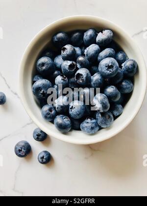 Blueberries in a white bowl Stock Photo