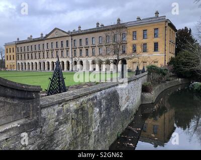 View of the New Building, Magdalen College, Oxford University, reflected in the River Cherwell, from Addison’s Walk. Stock Photo