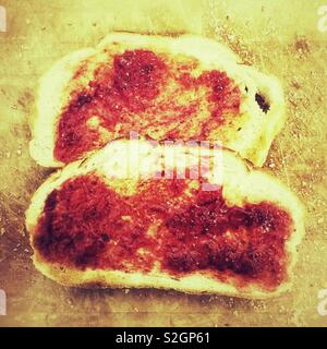 Strawberry jam on toast Stock Photo