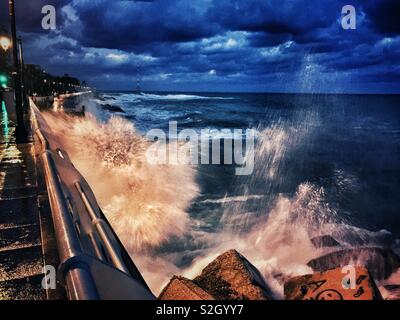 High waves breaking on the seashore Stock Photo