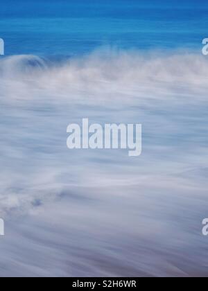 Long exposure of waves and surf rolling in California. Stock Photo