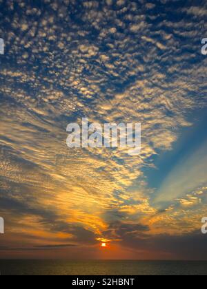 Sunrise over the ocean Stock Photo