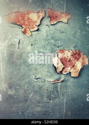 Peeling paint on an old wall in a derelict church Stock Photo