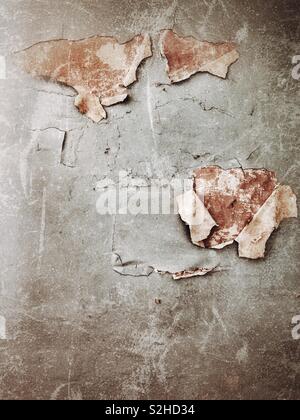 Peeling paint on an old wall in a derelict church Stock Photo