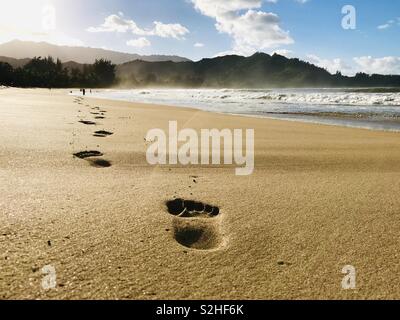 Footprints on the beach. Hanalei Bay, Kauai USA. Stock Photo