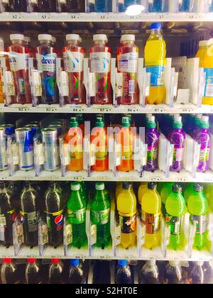 Bottles of drink in a vending machine. Stock Photo