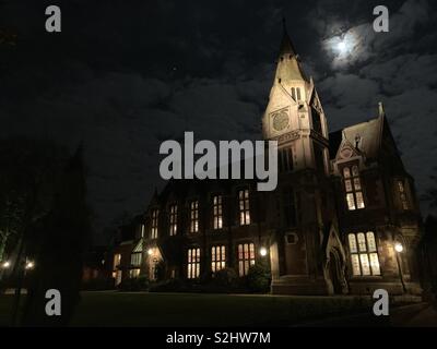 Pembroke College’s library at night with a full moon in the sky. University of Cambridge. Stock Photo