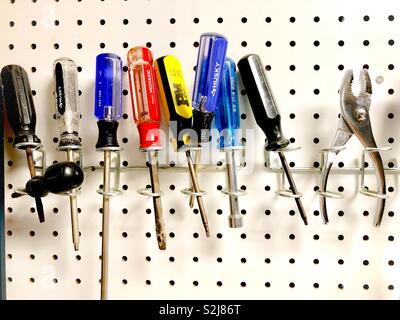 Tools on a peg board Stock Photo