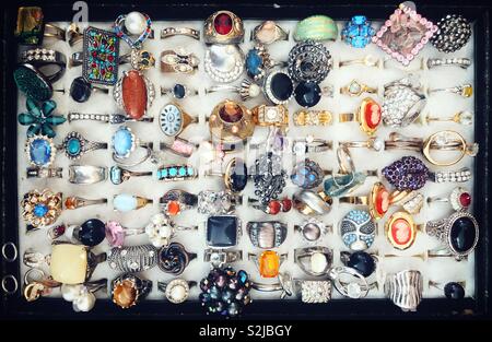 Costume jewellery rings for sale in an antique shop Stock Photo