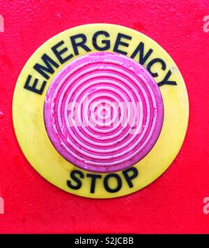 A big red Emergency Stop button in a square frame Stock Photo