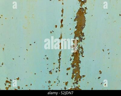 Rust on aqua colour weathered background Stock Photo