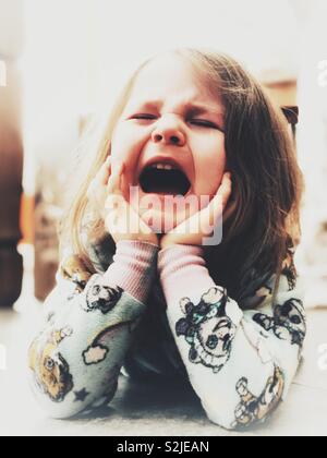 Crying girl close to having a temper tantrum Stock Photo