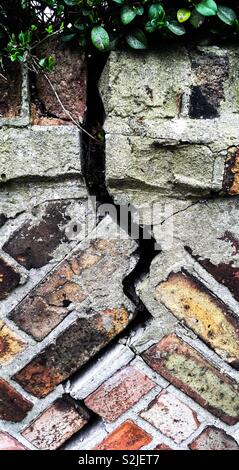 Crack in a brick wall Stock Photo