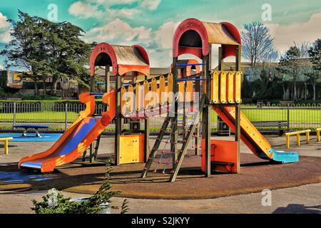 Empty climbing frame in children’s play park Stock Photo