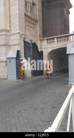 Swiss Soldiers guarding Vatican City entrance Stock Photo