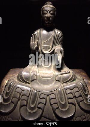 Buddhist statue in The Gallery of the Horyuji Treasures at the Tokyo National Museum. Stock Photo
