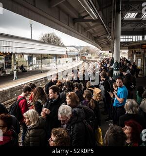 Crowds at Lewes station, West Sussex, waiting for a train to London on 23/03/2019. Many were heading to London from Brighton, diverted via Lewes due to rail engineering works. Stock Photo