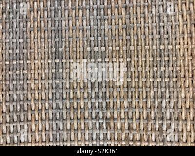 Full frame for a standard beige wicker basket weave. Stock Photo