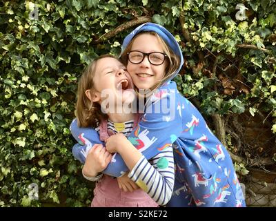Two happy sisters Stock Photo