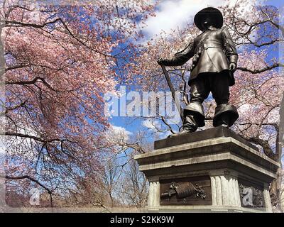 The pilgrims statue on Pilgrim hill in the spring time, Central Park, NYC, USA Stock Photo