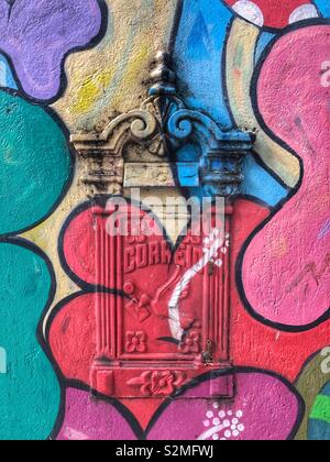 Spot the colourfully painted mailbox. Stock Photo