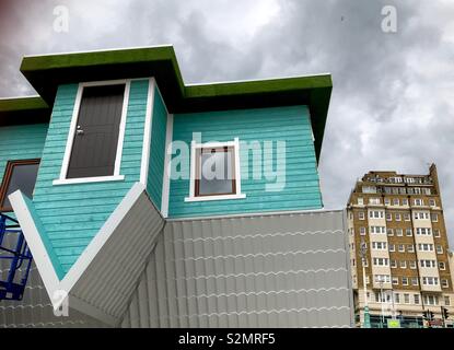 The new upside Down House on Brighton seafront a surrealist perspective Stock Photo
