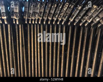 Closeup of the letter printing keys on an antique typewriter. Stock Photo