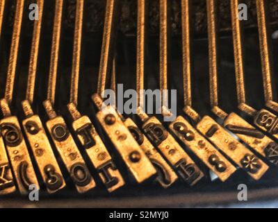 Soft focus Closeup of letter printing keys in an antique typewriter. Stock Photo