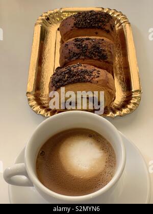 Rich breakfast with chocolate pastries Stock Photo