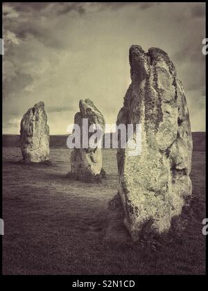 Three large upright Standing Stones form part of the SE Sector of the famous Stone Circles at Avebury in Wiltshire, England. This is the largest Megalithic Stone Circle in the World & a UNESCO site. Stock Photo