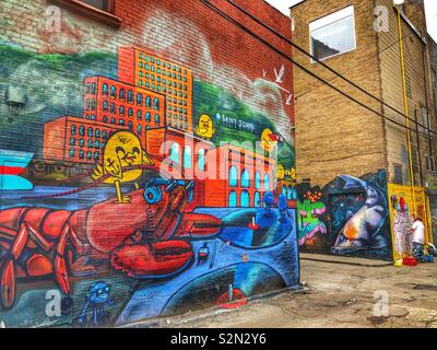 Urban street art in Graffiti Alley in downtown Toronto, Canada Stock Photo