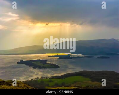 View across Loch Lomond from Conic Hill above Balmaha on spring morning. Scotland. UK. Stock Photo