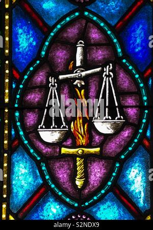 Stained Glass image of the Flaming Sword of Justice Stock Photo