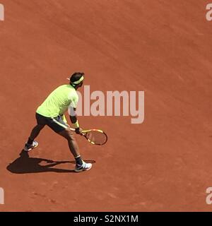 Rafael Nadal waits to return serve at the 2019 French Open, Roland-Garros Stock Photo