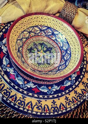 Brightly colored and patterned bowls and plates on sale at Williams Sonoma, Time Warner Center, NYC, USA Stock Photo