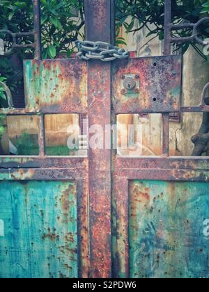 Old rusty gate locked with chains Beirut Lebanon Middle East Stock Photo
