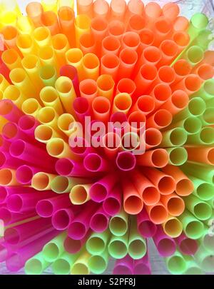 Coloured plastic drinking straws viewed from above. Stock Photo