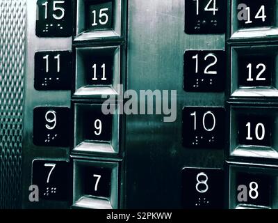 Old elevator buttons minus number 13 Stock Photo