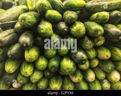 Full frame closeup of fresh delicious ripe raw green pickles. Stock Photo