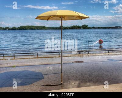 High water levels flood the beach on Toronto’s waterfront. Stock Photo