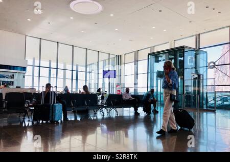 Passengers waiting in the departures lounge at Gibraltar airport Stock Photo