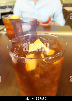 Iced tea glasses served at a casual restaurant, USA Stock Photo