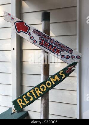 Burger Shack and Restroom Wooden Sign Stock Photo