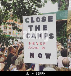 July 2, 2019. Middle Collegiate Church, Manhattan, New York City. A sign at the Close the Camps Rally reads “CLOSE THE CAMPS. NEVER AGAIN IS NOW.” Stock Photo